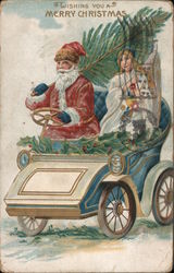 Wishing you Merry Christmas - Santa Driving a Car with an Angel Postcard