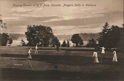 Playing Tennis in Q.V. Park, Niagara Fall in the Distance Postcard