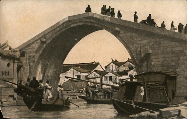 Sampans on a River in China Canoes & Rowboats