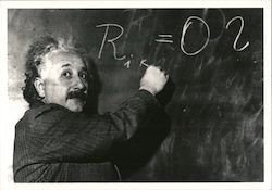 Albert Einstein Writing on Chalkboard Postcard