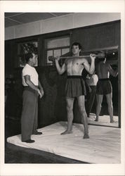 Rock Hudson Lifting Weights, 1952 Postcard