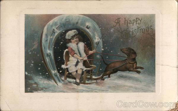 A Happy Christmas - girl on sled pulled by dog through snowy outdoors