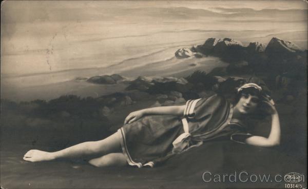 Woman Posing on Beach Cliff Women