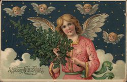 A Merry Christmas - an angel in the sky, holding Christmas tree Postcard