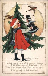 Christmas - child with doll near Christmas pine Postcard