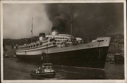 Large Steamship Rex in Port with Adjacent Tugboat Postcard