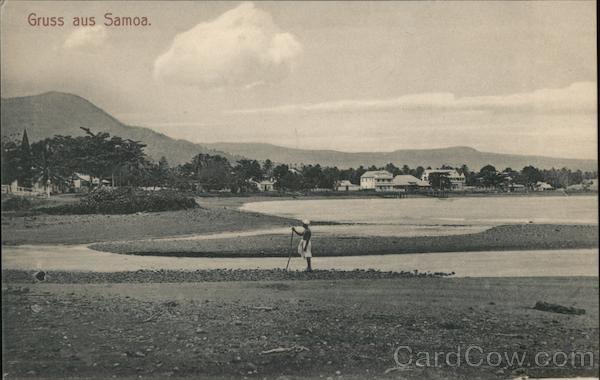 View of Samoan coastline with a man standing Apia South Pacific
