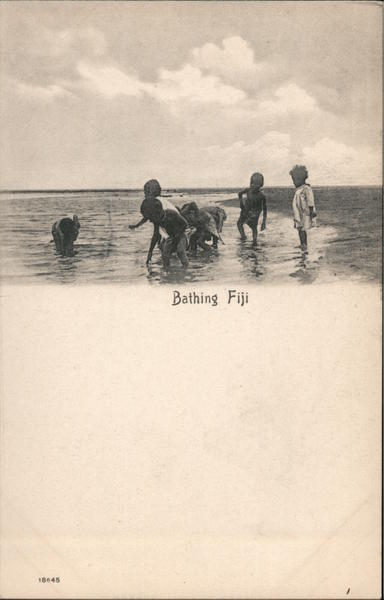 Children playing on a beach in Fiji South Pacific