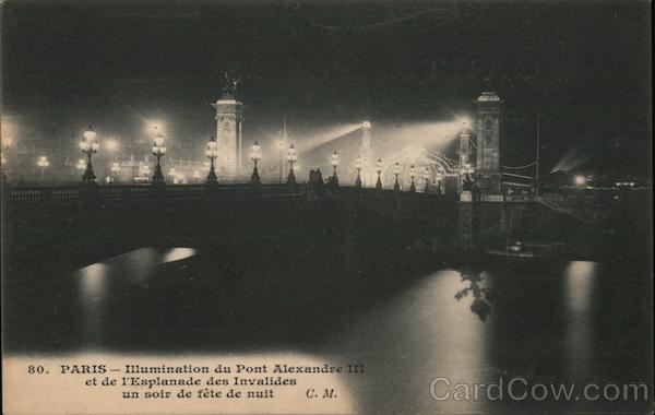 The Pont Alexandre III bridge lit up at night Paris France