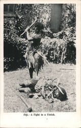 Two Fijian men duelling Postcard