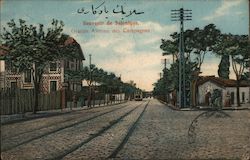 Modernized street in Thessaloniki with train tracks and utility poles Postcard