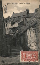 Woman standing in a stairwell in Vervins, France Postcard