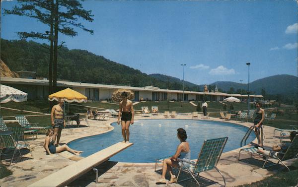 Howard Johnson's Motor Lodge and Restaurant; People sit around pool watching boy dive Asheville North Carolina