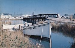 Crab Boat in Canal & Foot Bridge Crossing to Residential Section Postcard