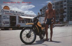 Man & motorcycle on Daytona Beach Postcard