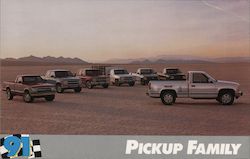 Pickup Family Seven Pickup Trucks Parked with Mountains in the Background Postcard