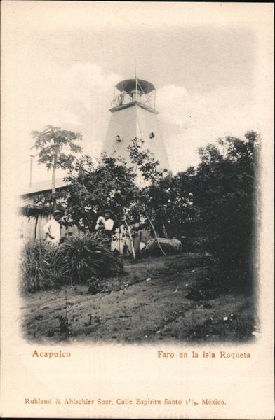 Tow men standing in front of a lighthouse Isla de La Roqueta GR Mexico
