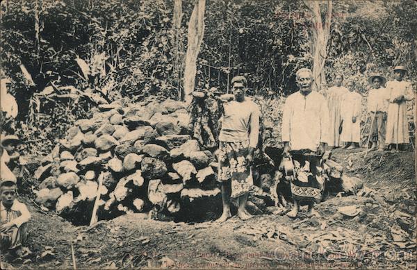 Natives Standing by a Pile of Rocks New Caledonia South Pacific