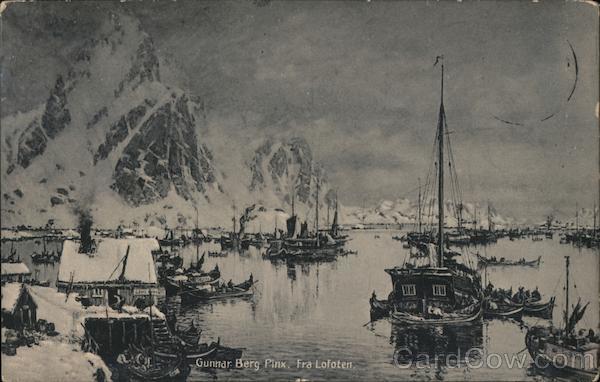Fishing boats in the sea with fjords in the background Lofoten Norway