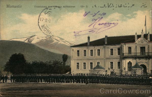 Military cadets lined up outside a school with a mountain in the distance Monastir Tunisia