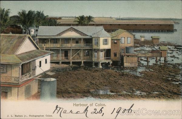 Houses and a pier on a harbor Colon Panama J. L. Maduro Jr.
