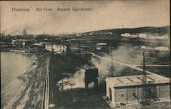 Factory furnaces on the ocean coast Postcard