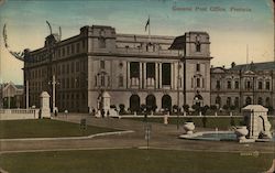Exterior of a post office with pedestrians out front Postcard
