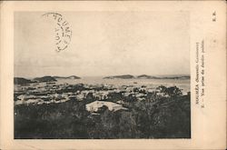 Panoramic view of a coastal town Postcard