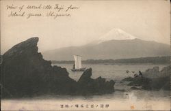 View of Mount Fuji across an inlet with a sail boat Postcard