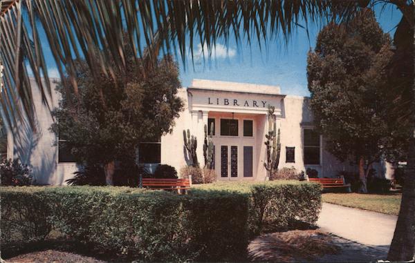 Library framed by green palms Hollywood Florida