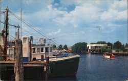 Boats Docked in Freeport Canal Postcard