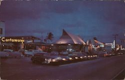 Scene at Night Along Motel Row Postcard