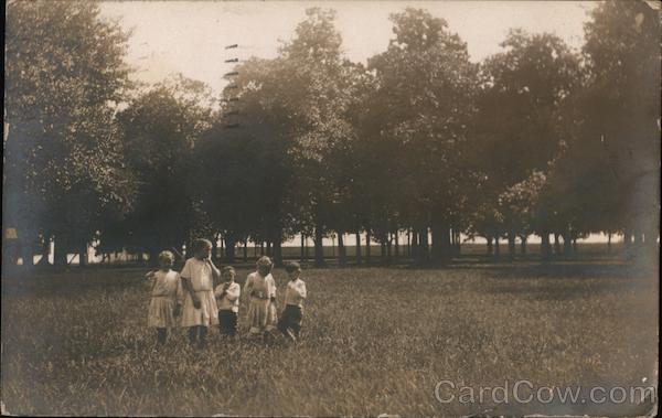 Five Children Standing in a Field