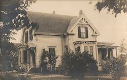 Victorian style house and front yard Postcard