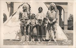 A Group of Indians Standing in Front of a Teepee Postcard