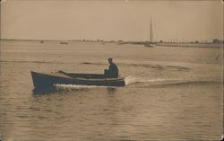 Man in Speedboat on Water Postcard