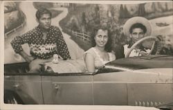 Three People Posing in a Car, Studio Photo Postcard