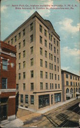 Spirit Pub Co., highest building in country. Y.M.C.A. Bldg beyond, N. Findley St Punxsutawney, PA Postcard Postcard Postcard