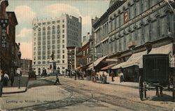 Looking up Middle St., Showing Fidelity Building Postcard