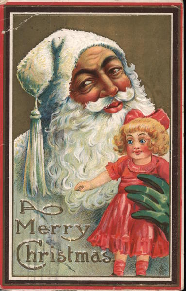 Santa Claus holding a smiling doll.