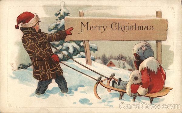 Boy pulling his sister on a sled in the snow Children