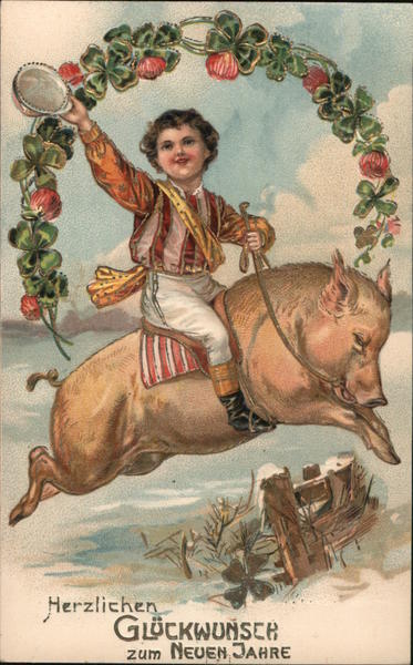 Child Riding a pig through a wreath and waving a hat.