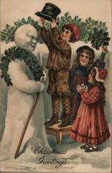 Christmas Greetings. Children Decorating Snowman Postcard