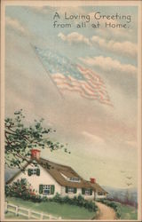 A Loving Greeting from all at Home. - House and Yard, American Flag in the Clouds Postcard