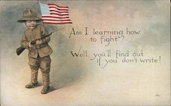 Boy holding gun: "Am I learning how to fight? Well you won't find out if you don't write!" Postcard
