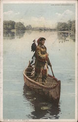 Native Standing in Canoe Postcard