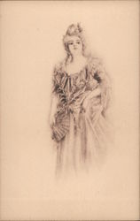 A woman standing in a long dress with a fabric fan in her hand looking into the distance. Postcard