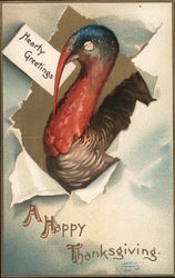 Turkey breaking through paper holding "hearty greetings" card Postcard