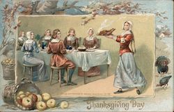Thanksgiving Day - Men & Women Pilgrims Around the Dinner Table Served by a Pilgrim Woman Postcard