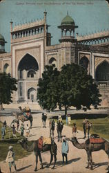 Indian men and camels in front of large building Postcard